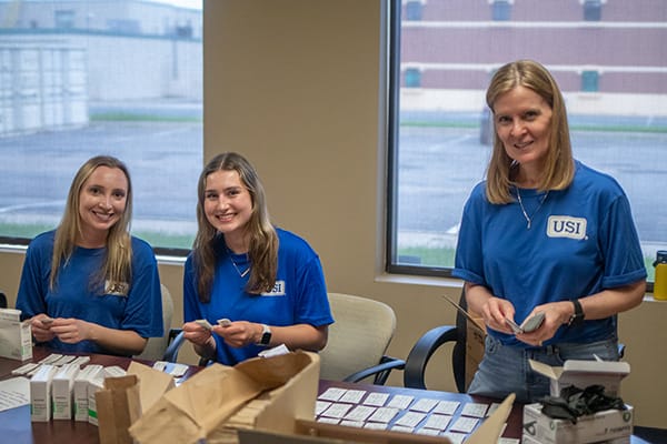 USI volunteers spent the day putting together harm reduction kits for Avivo's Street Outreach Team and other Avivo staff to distribute.